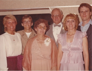 Genette at wedding reception with Joyce, Jay, Mom, Dad and Me